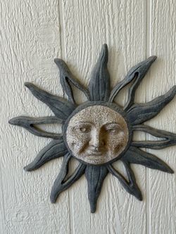 Grey metal sun