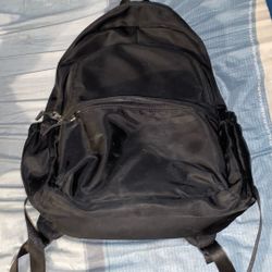 1 Black Backpack About 7 Pockets And Plenty Of Space 