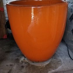 Orange ceramic planter pot 