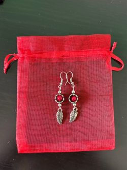 Silver feather drop earrings