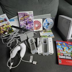 Ultimate Wii Bundle with Mariokart, Wii sports, Mario party, Mario bros Complete