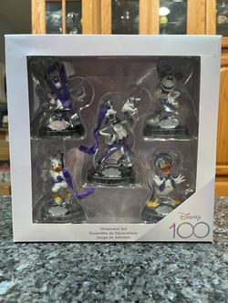Walt Disney 100 Mickey Mouse and friend’s Christmas Ornaments. The set has 5 ornaments. Brand new never opened.