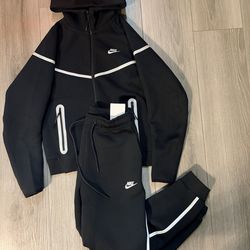 Black reflective Nike Tech