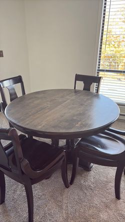 Free solid Dining room table & 4 chairs