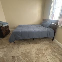 Dresser And Full Size Metal Frame Bed With Wooden Backboard