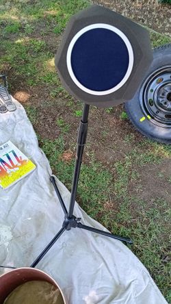 Stand and vocal shield