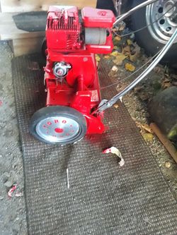 Vintage Toro Sportlawn Engine Powered Reel Mower in running condition