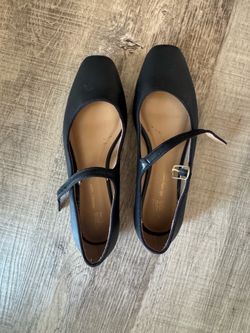 Black leather Mary Jane shoes with buckle detail
