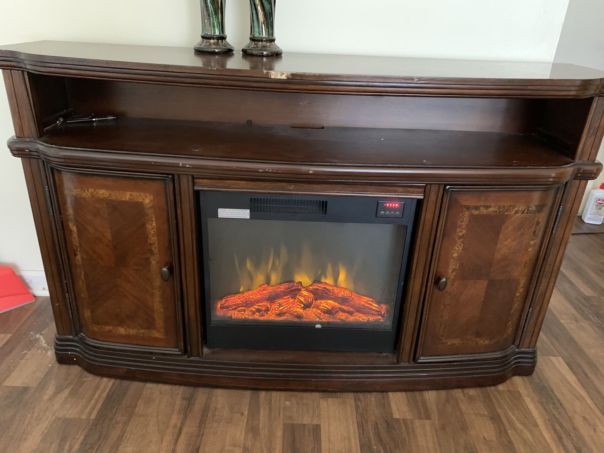Electric Fireplace/Tv stand 72 inch Real wood not press wood very heavy and sturdy. Can heat an entire room easily
