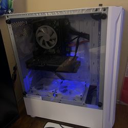 White gaming PC and monitor