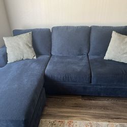 Living Spaces Sofa With Reversible Chaise 