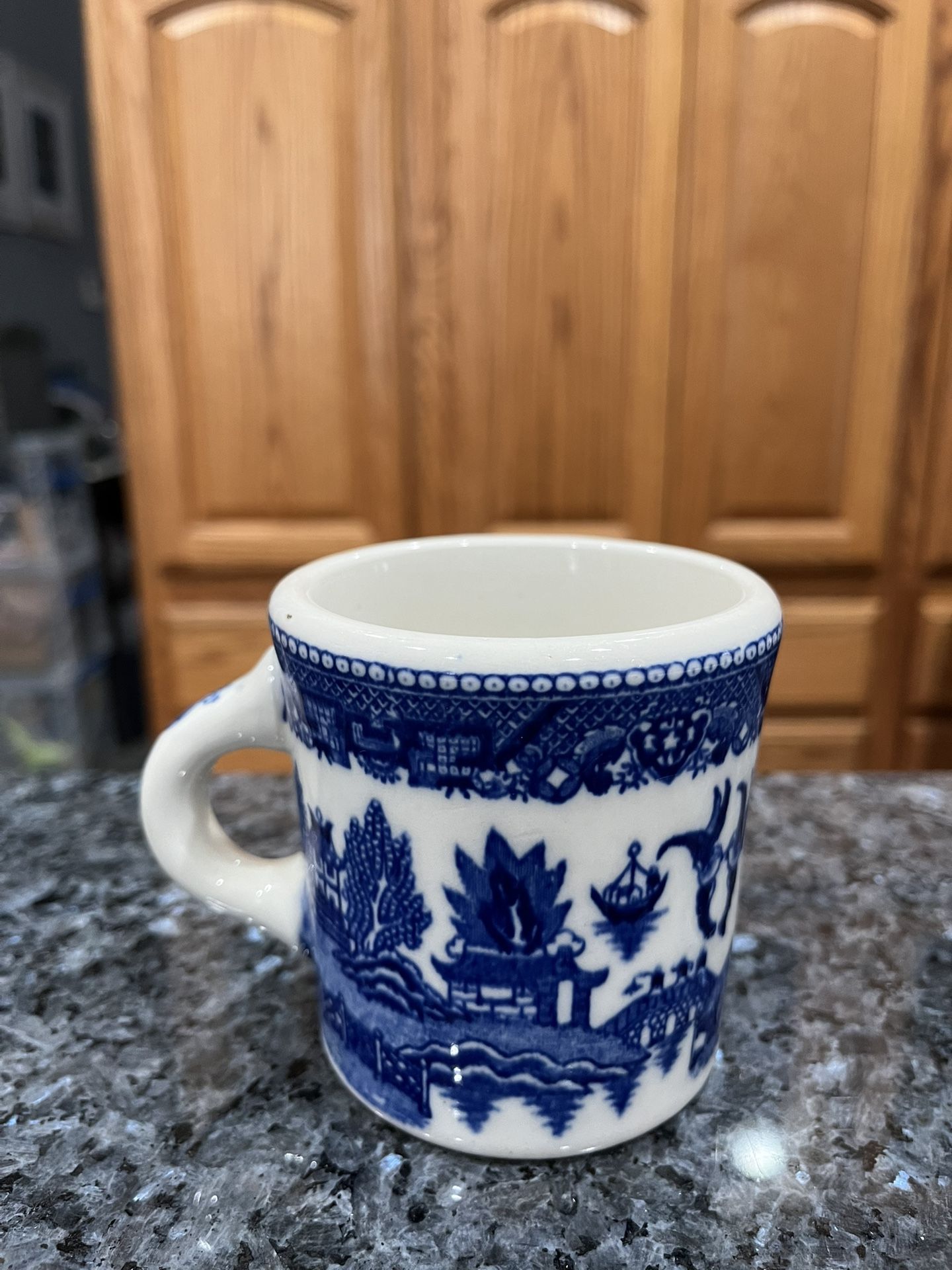 Vintage Blue Willow Coffee Mug cup. Size approximately 3 1/2 inches tall. Preowned. Has been on display in a cabinet.