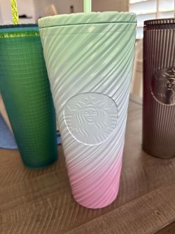 $40 for 5 tumblers and leopard straws and 2 straw cleaners Starbucks and blue leopard with handle