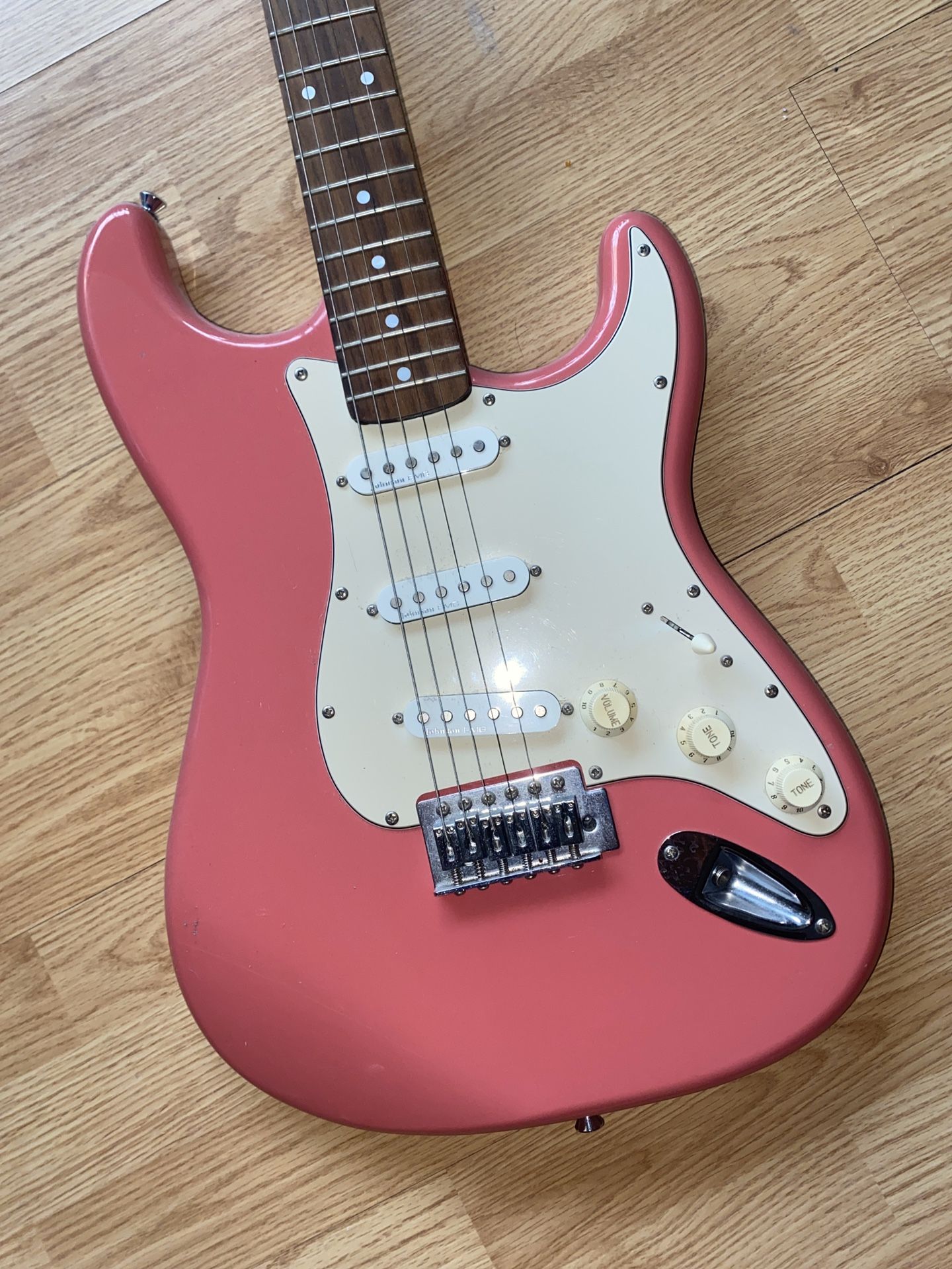 Pink And White Electric Guitar