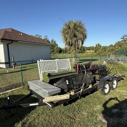 7X18 Double Axle Trailer With Multiple Skidsteer Attachments 