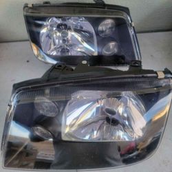 99-05 Volkswagen Jetta Headlights LUCES MICAS FAROS Calaveras Focos