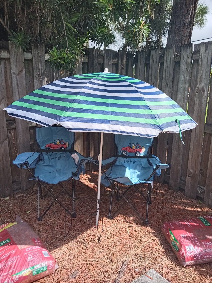 Summer Chairs And Umbrella