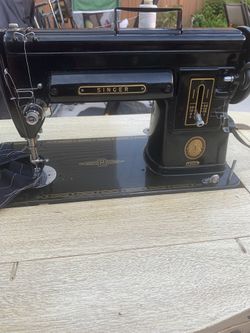 Singer sewing machine with table