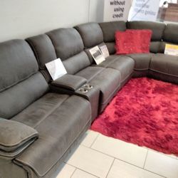 Alejandra gray reclining sectional only $1499. Easy finance option. Same day delivery.