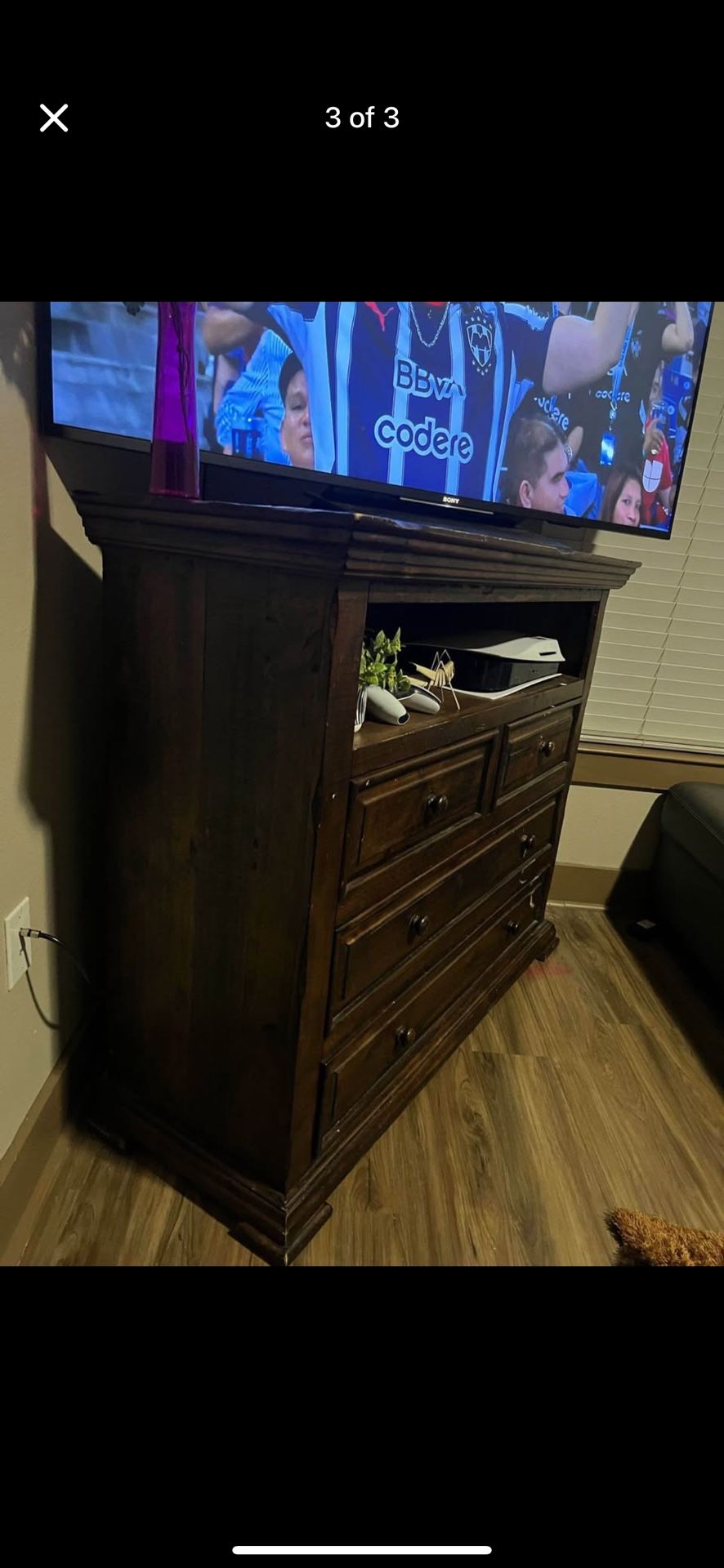 wooden chest of drawers with integrated power outlet