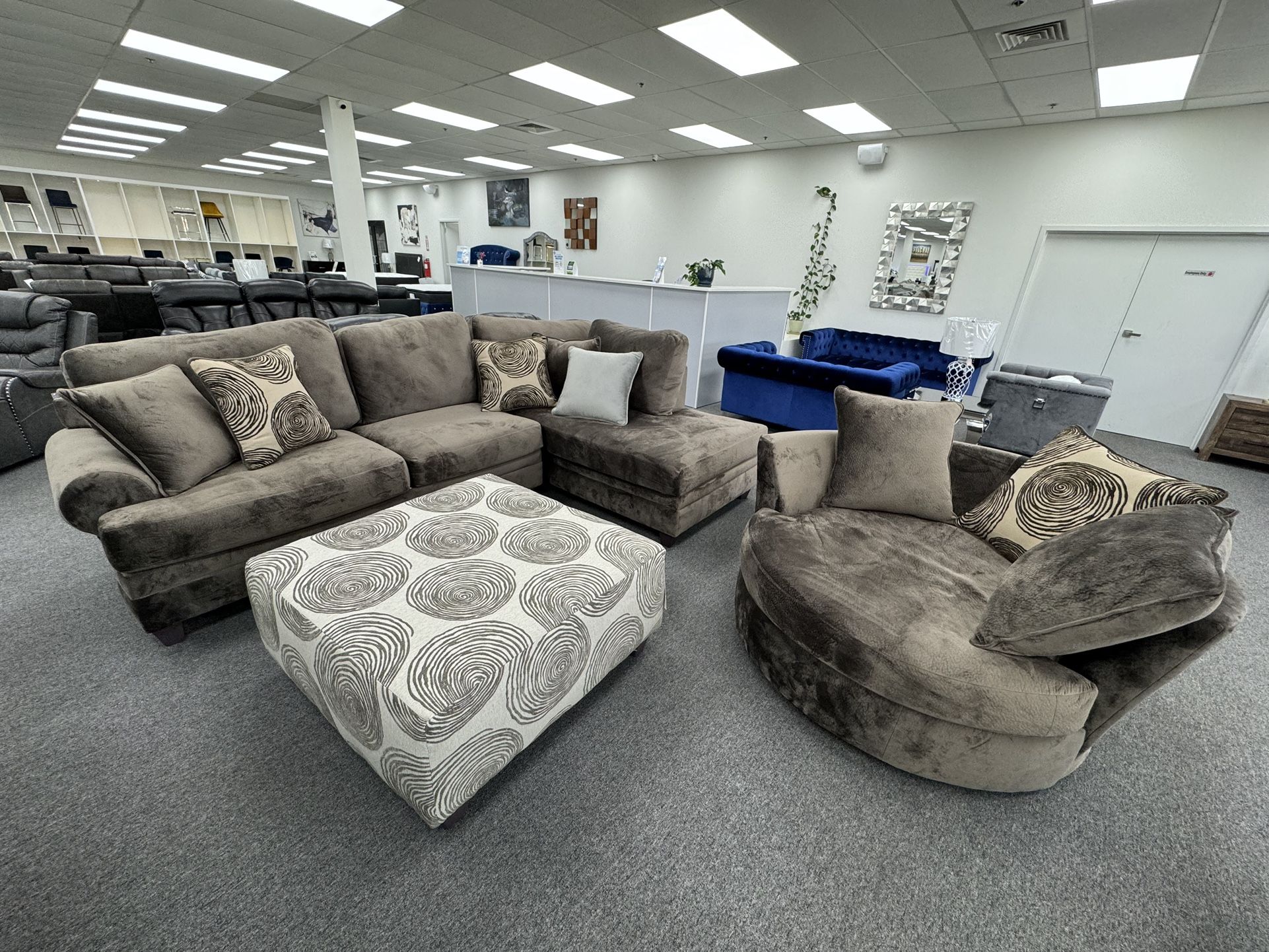 L Shaped Sectional With 4 Patterned Toss Cushions, Ottoman And Swivel Chair On Promotion, Made In USA, 5 Year Warranty Included