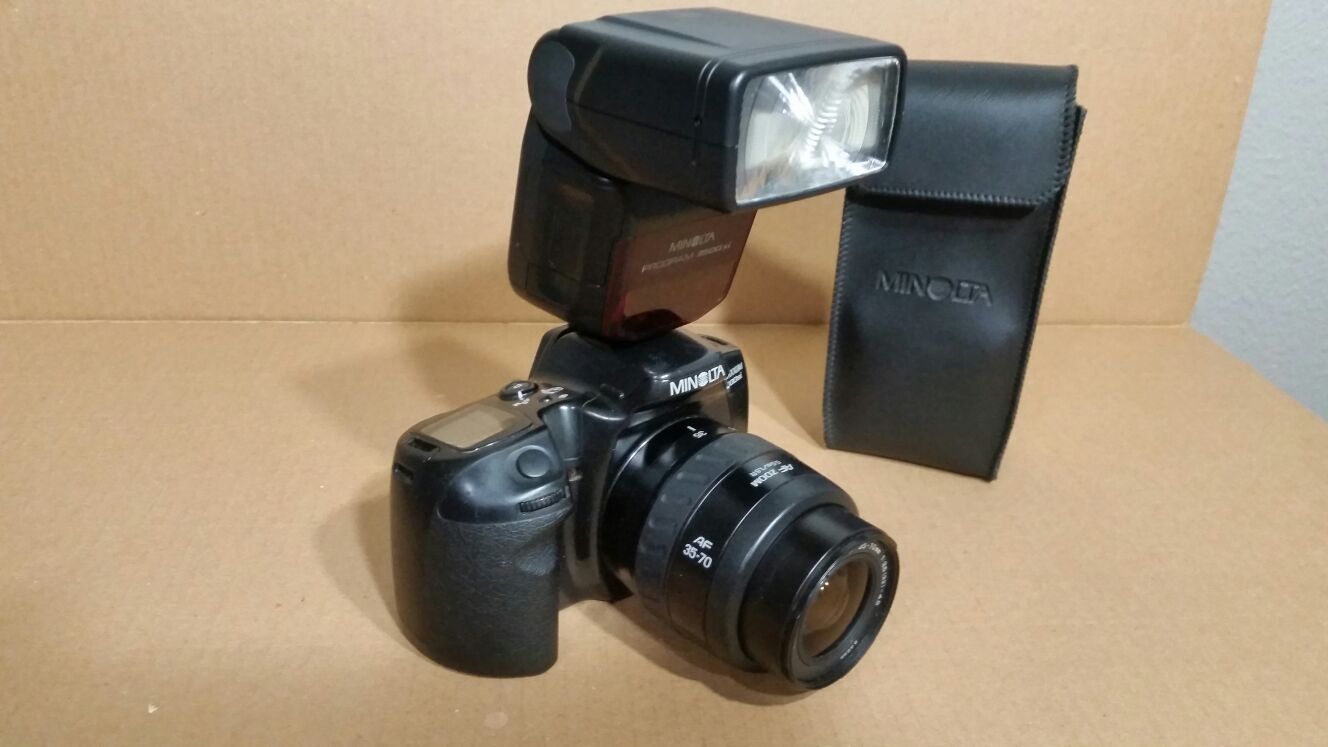 Minolta Camera with lens and flash