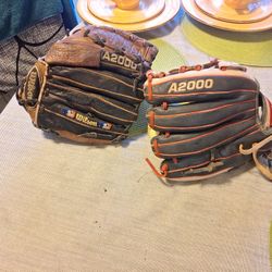 WILSON A2000 LEFT AND RIGHT HAND $180. EACH GLOVE // FIRM PRICE 