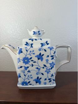 This rare Windsor England square teapot is a luxurious piece for any tea lover.