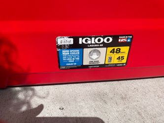 Igloo 48-Quart Laguna Hard Sided Cooler features a vibrant red base and a white lid.