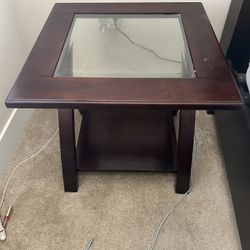 Wooden end table with glass top