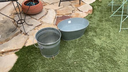 2 galvanized steel containers