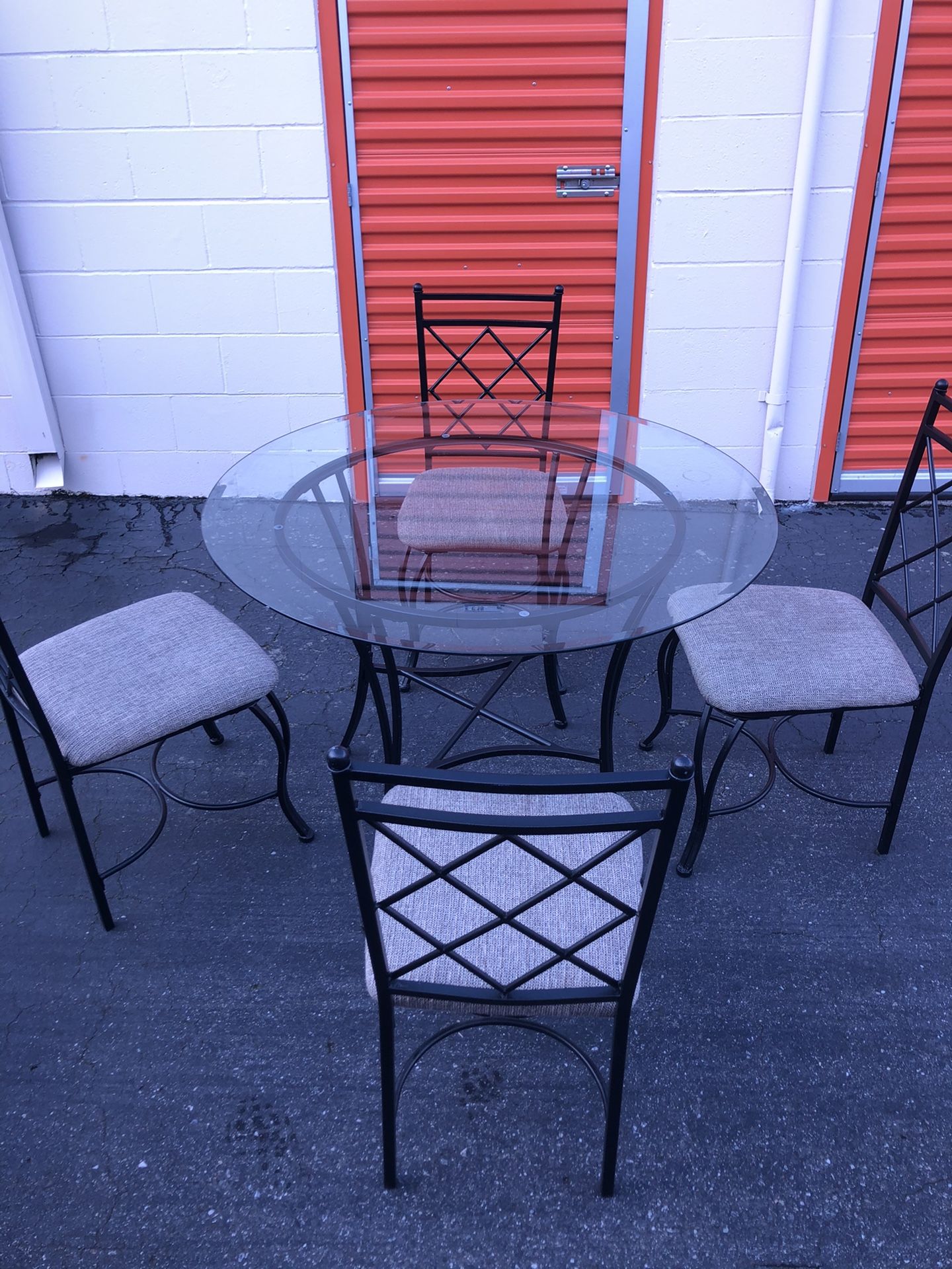 Glass top kitchen table with 4 chairs