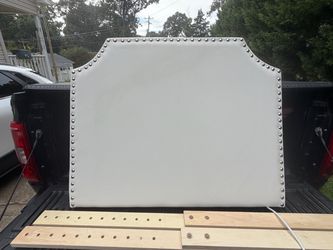 White Upholstered Headboard with Nailhead Trim