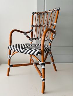 $70 each Rattan Bistro Armchair with Black and White Weave