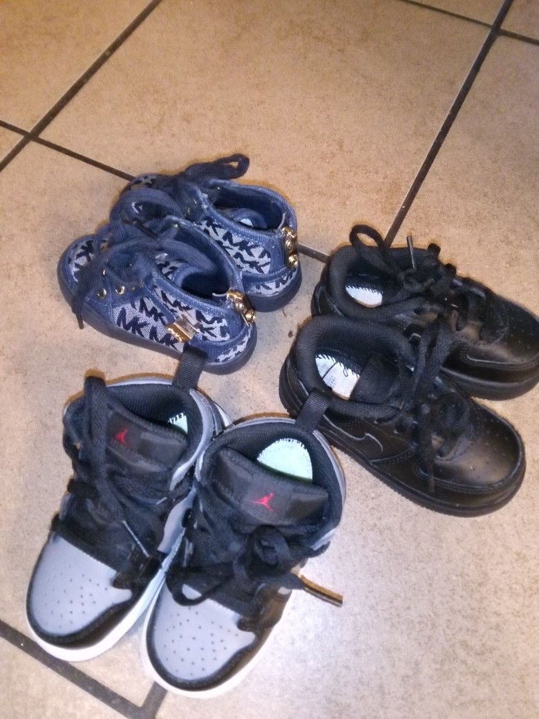 Kids Shoes.. Air Jordans Black Low Top Nikes And Michael Kors Boots