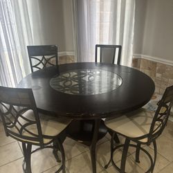 Round Dark Wood Dining Table