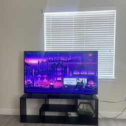 Brand new Roku 65 inch Tv. Comes with Stand, Roku remote and LG speaker is included. 
