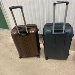 Two 26 inch hard shells luggages  on four wheels. Samsonite and Gabbiano $50 each