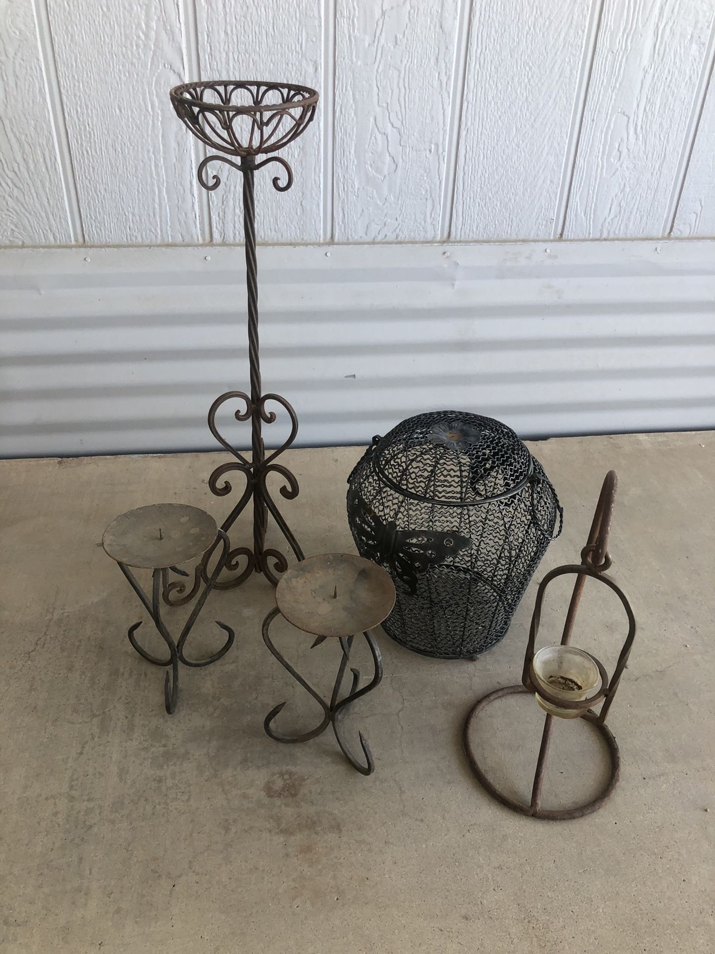Wrought iron candle holders-garden