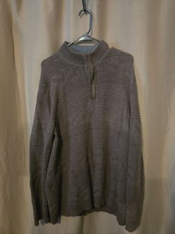 Brown knit quarter zip sweater