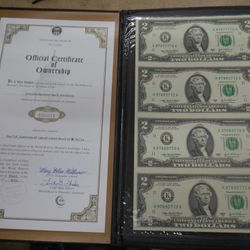 EXCHANGE CERTIFIED GENUINE BANKERS VAULT PORTFOLIO SET OF UNCUT 2003 $2 BILLS. very good condition. 