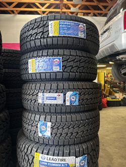 265/65/17 Lion Sport All terrain mounted and balanced included