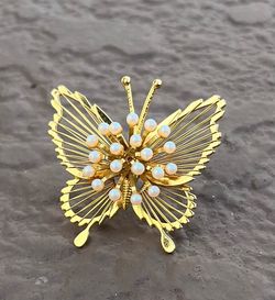 Vintage Monet Butterfly Brooch with Gold Toned Wings and Faux Pearls