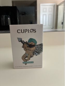 Cupids hypnosis cologne right out not opened yet the color is blue