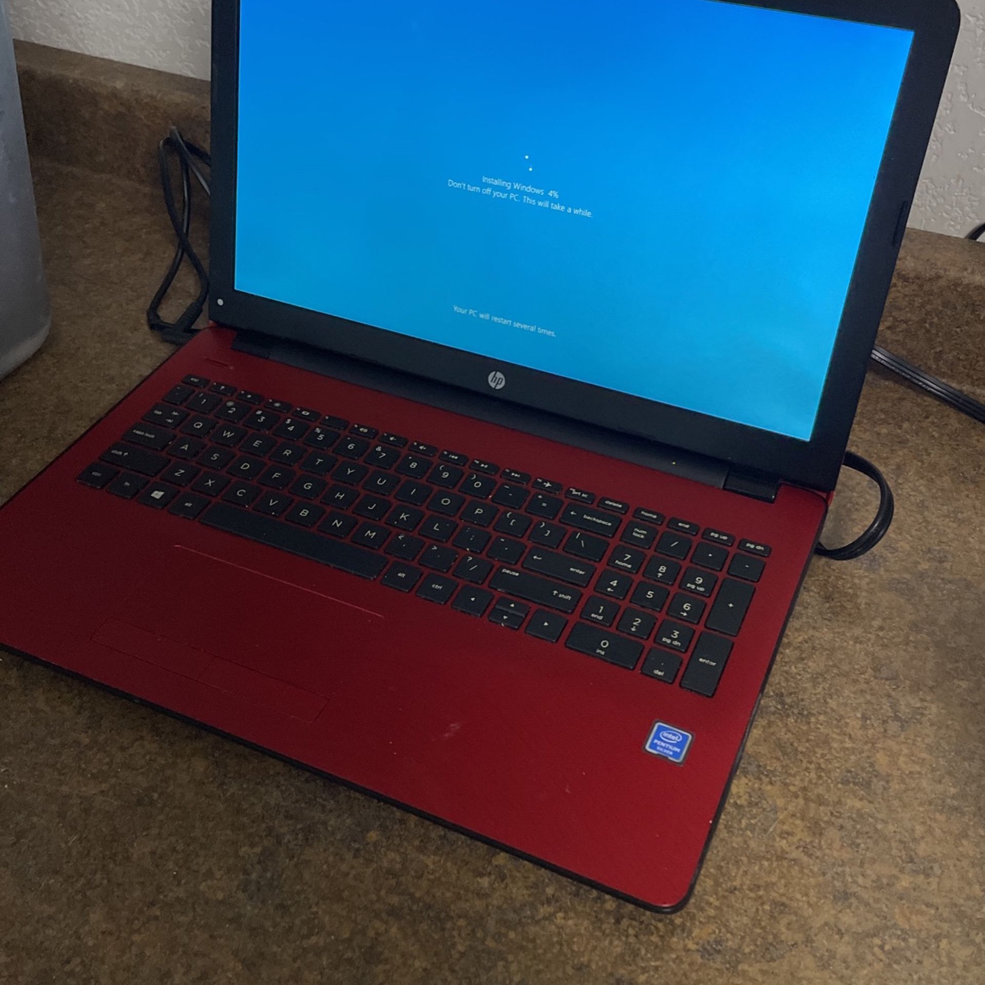 HP 15-BS244WM laptop with charger