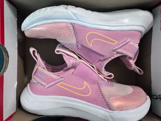 kids Nike shoes size 11c peach and pink