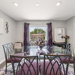 Glass Dining Table And Purple Chairs