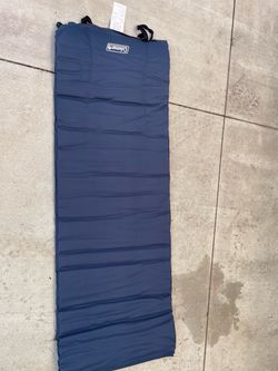 Self-inflating sleeping pads