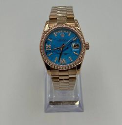 Elegant Blue & Gold Ladies Timepiece