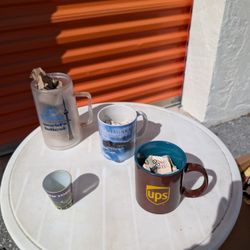 Collection Of Mugs And Shot Glasses